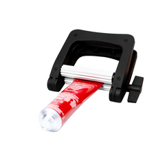 Presă pentru stors tubul de vopsea Schwarzkopf Professional